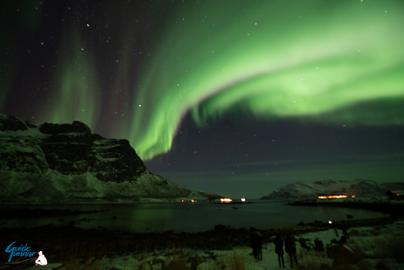 Northern Lights over the fjords and mountains